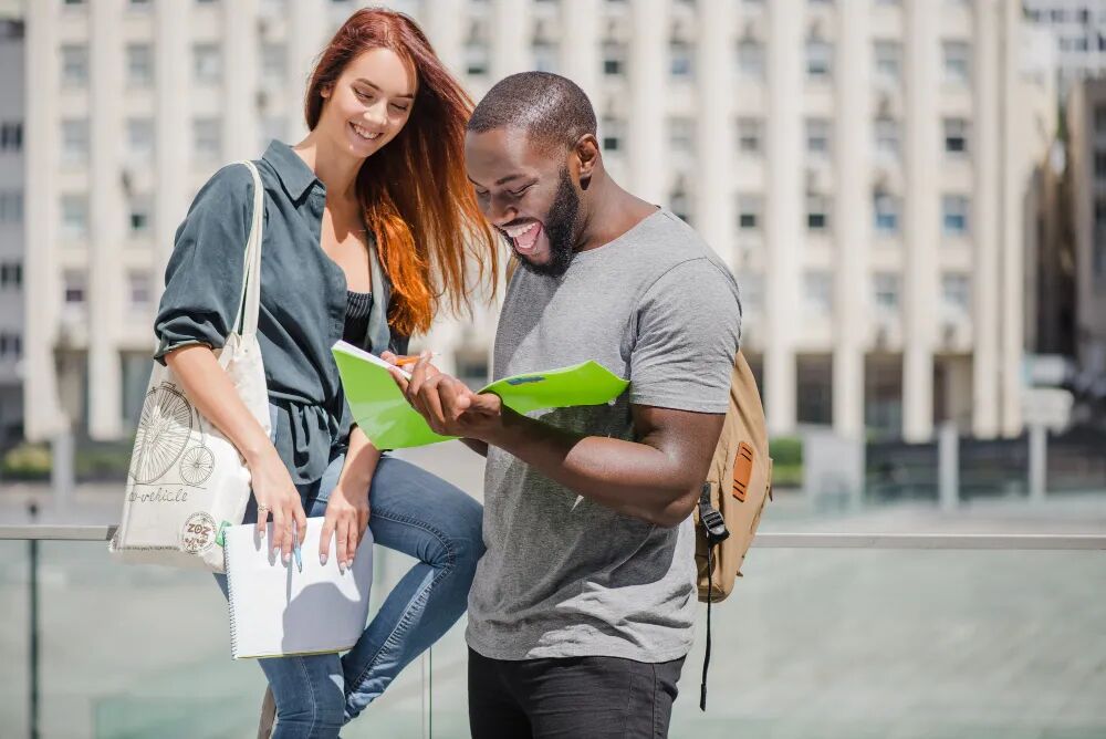 man-woman-students-with-documents.jpg